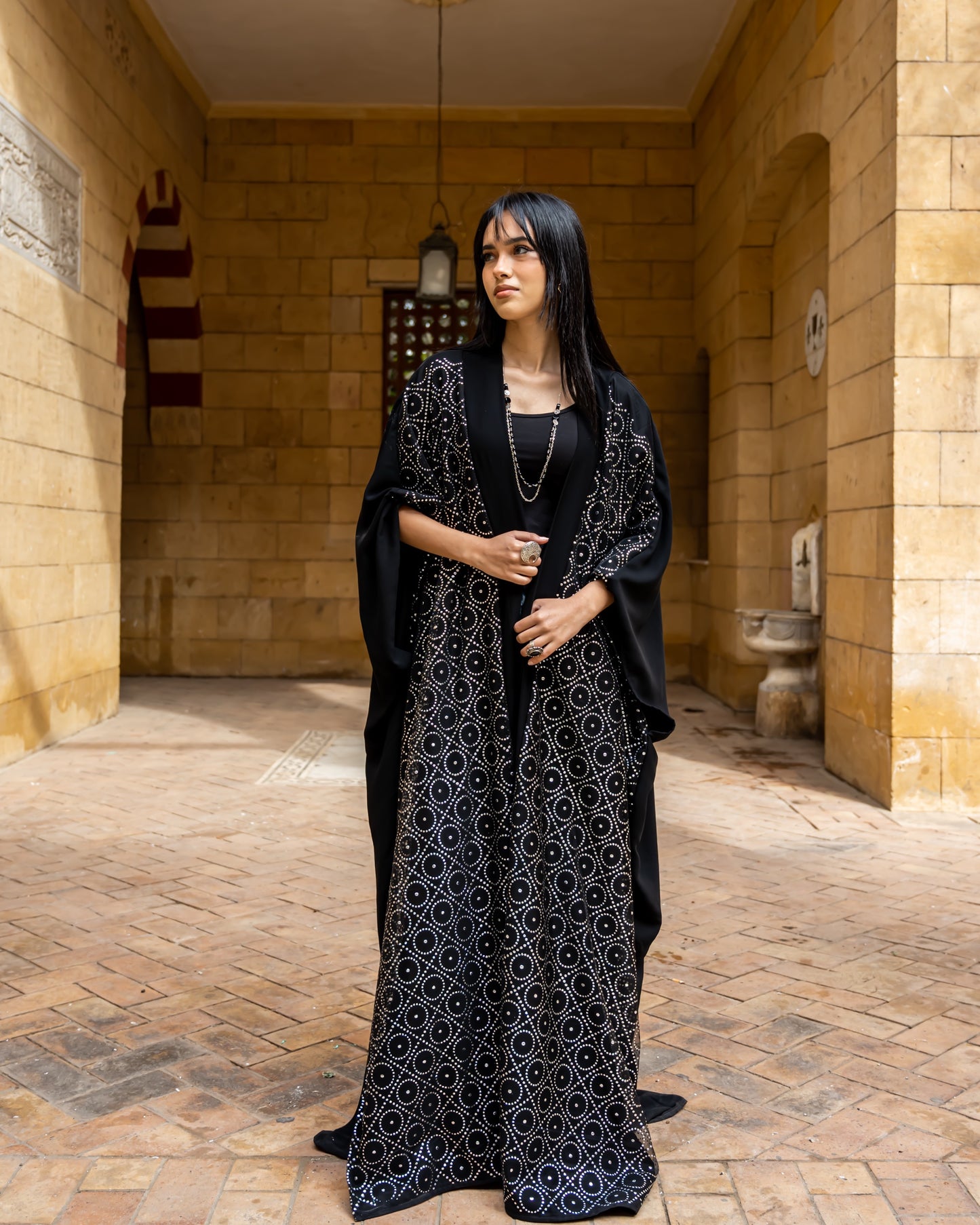 Qamar kaftan in circles