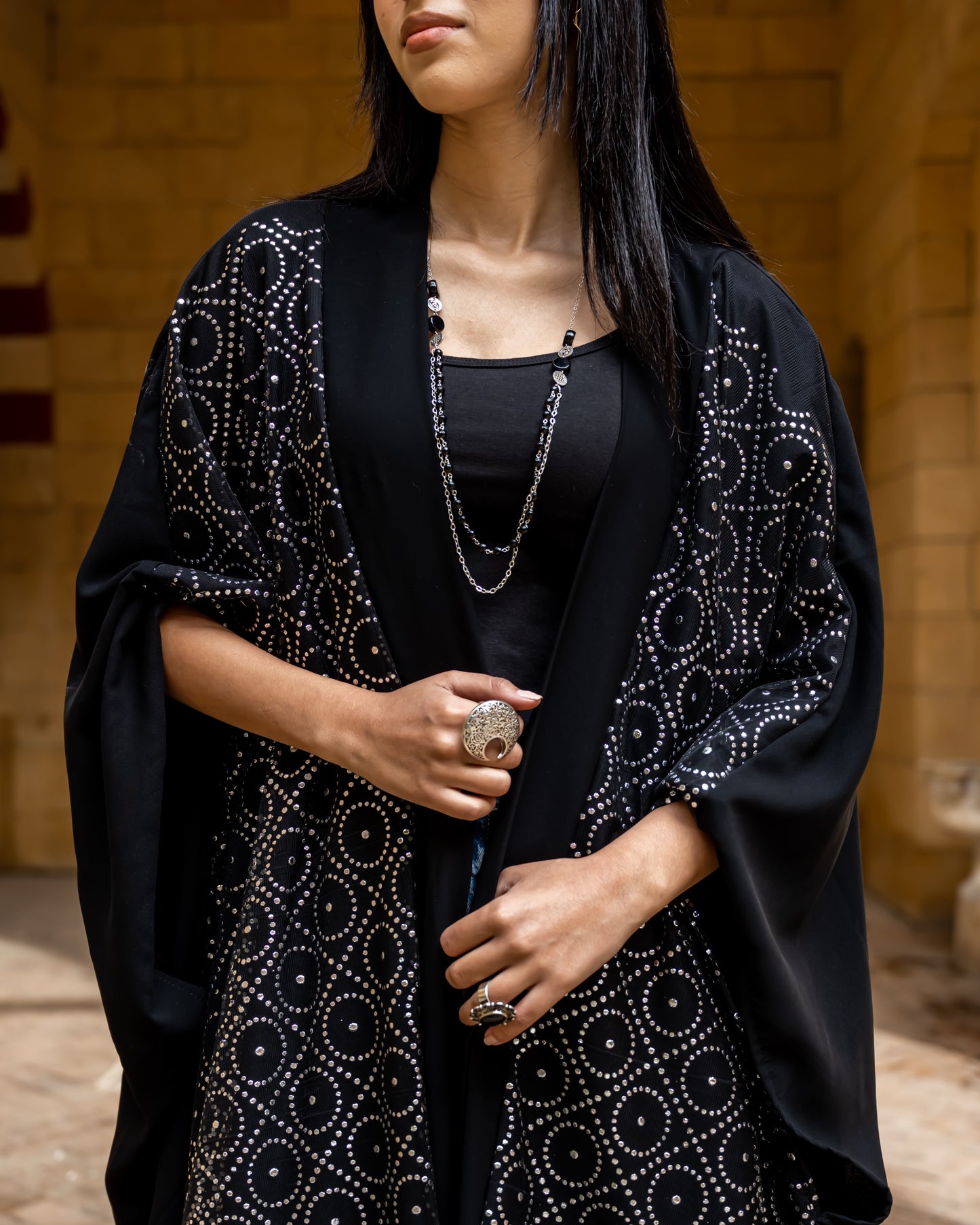 Qamar kaftan in circles